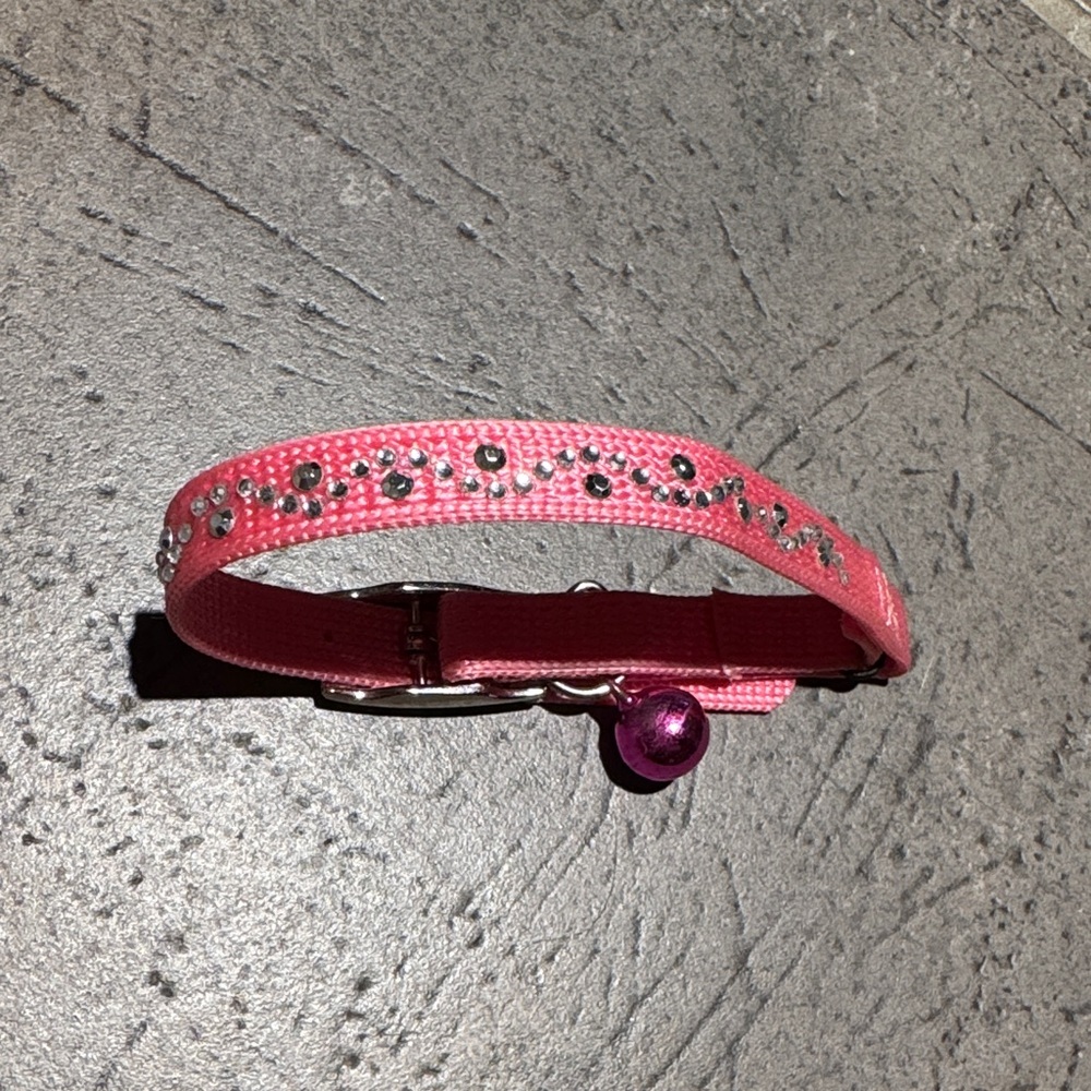 Pink Rhinestone Cat Collar or small dog, adorned with rhinestones and a bell.
